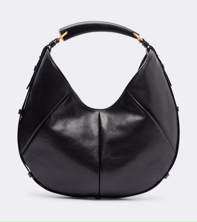A black leather hobo handbag with gold-tone hardware, shown against a light gray background.